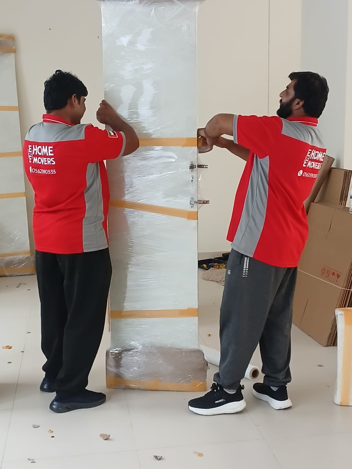 Our relocation team setting up workstations after an office move