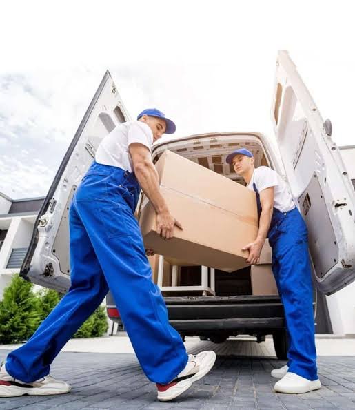 Office movers and packers in Dubai loading a truck for a business relocation